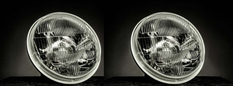 Koito H4 Headlight Upgrade Kit pair with clear lenses for enhanced road illumination.